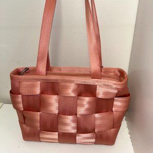Brown shoulder bag seatbelt bag.